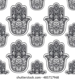 Seamless pattern with indian hand drawn hamsa. Hamsa henna tattoo with ethnic ornament. Black and white indian background. Illustration in zentangle style.