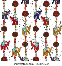 seamless pattern with indian pendant of beads, pompoms and elephants on a white background