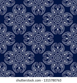 Seamless pattern in indian style. Dark blue background with white design