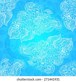 Seamless pattern in Indian style. Glowing ornament on blue background.Paisley and the hand drawn flowers.