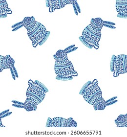 Seamless pattern with indigo blue cute circular rabbits textured background pattern design in textiles.
