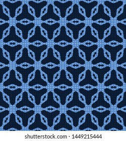 Seamless pattern indigo blue hand drawn snowflake. Repeating winter star geometric. Monochrome festive design textile. Japanese style dyed batik all over print. Retro trendy masculine vector swatch.