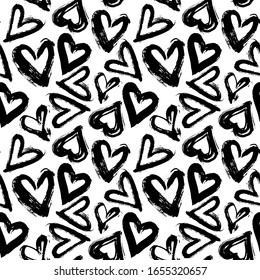 Seamless pattern of ink drawn hearts. Isolated on a white background. Vector stock illustration.