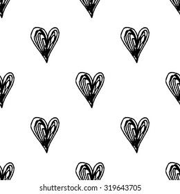 Seamless pattern with ink hearts. Abstract hand drawn background. Stylish modern print. Cute background for website, texture, fabric, invitation, save the date cards. Monochrome scandinavian style.