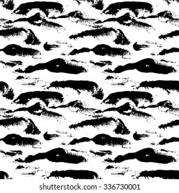 Seamless pattern with ink palm imprints. Sloppy strokes of a paint. Vector illustration.