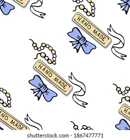 Seamless pattern with with the inscription handmade. Vector illustration.