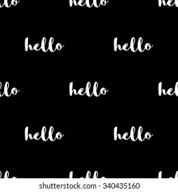 Seamless pattern with the inscription Hello with white lettering on a black background.