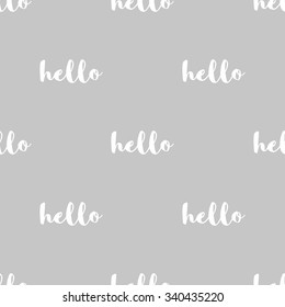 Seamless pattern with the inscription Hello with white lettering on a gray background.