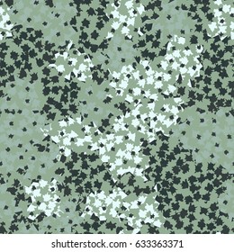 Seamless pattern. A pattern of irregular shapes of angular elements. Fashionable camouflage.  Gray-green tones.