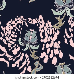 Seamless pattern of Jaguar and leopard stripes. Pattern in spots with flowers.
