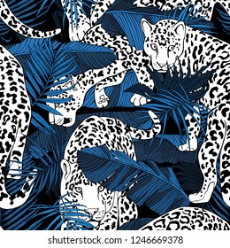 Seamless pattern. Jaguars and a Tropical banana, exotic palm leaves at a dark blue night. Textile composition, hand drawn style print. Vector illustration.