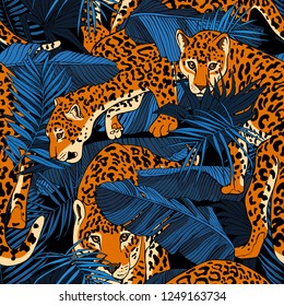 Seamless pattern. Jaguars and a Tropical banana, exotic palm leaves at a dark blue night. Textile composition, hand drawn style print. Vector illustration.