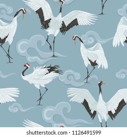 seamless pattern with japanese cranes and clouds