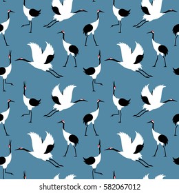 Seamless pattern with japanese cranes in  a modern flat geometric style