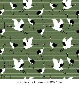 Seamless pattern with japanese cranes in  a modern flat geometric style