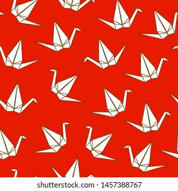 Seamless pattern with Japanese origami cranes  on red background