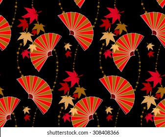 Seamless pattern in the Japanese style with a stylized sailing fans gold and orange color and maple leaves on a black background.