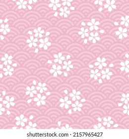 Seamless pattern with Japanese waves and sakura flowers. Traditional print with cherry blossoms. 