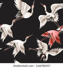 Seamless pattern with Japanese white crane in batik style. Vector illustration.