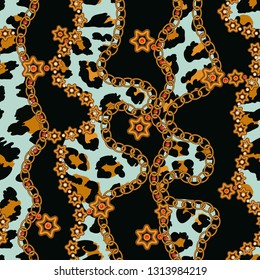 Seamless pattern of jewelry and leopard spots on black background.