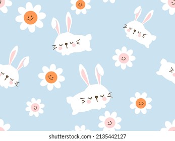 Seamless pattern with jumping rabbit cartoons and daisy flower on blue background vector illustration. 