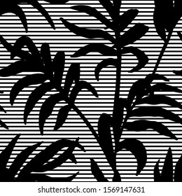 Seamless pattern. Jungle background. Tropic leaves. Summer print. Black and white pattern. Palm leaf. Modern stylish texture. Trendy design. Monochrome  contemporary pattern with tropical leaves