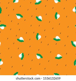 Seamless pattern of kawaii doodle white and green lettuce on orange background for wallpaper, paper business, fabric work, food issue. Vector design.
