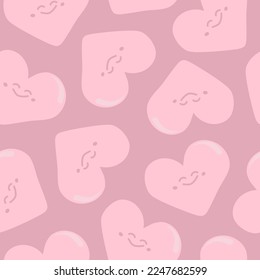 Seamless pattern with kawaii hearts in pink tones