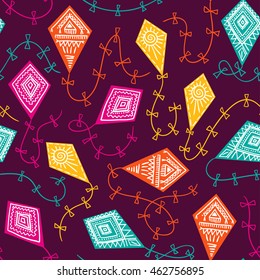 Seamless pattern with kites in the sky. Vector childish fabric design. Bright background.