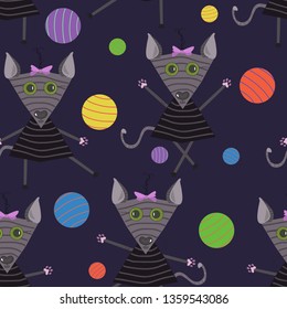 Seamless pattern of kittens on a black background and multicolored balls