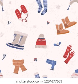 Seamless pattern with knitted apparel and winter boots on light background. Backdrop with woolen seasonal clothing and footwear. Flat cartoon vector illustration for wrapping paper, textile print.