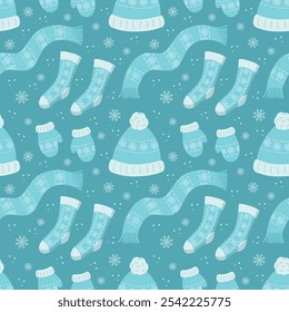 Seamless pattern, knitted blue hats and scarves with snowflake ornament. Christmas background, print, textile, vector
