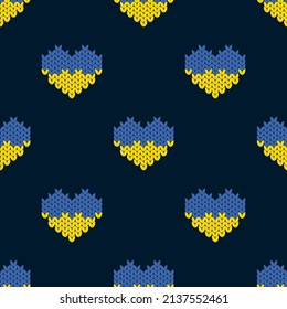 Seamless pattern with knitted hearts, colors of the Ukrainian flag. Glory to Ukraine. Vector illustration.