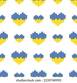 Seamless pattern with knitted hearts, colors of the Ukrainian flag. Glory to Ukraine. Vector illustration.