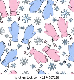 Seamless pattern with knitted mittens  on a white background.  Winter. Print for bed linens,clothes,  fabric, textiles, wallpaper, greeting cards, wrapping paper, gift box.
