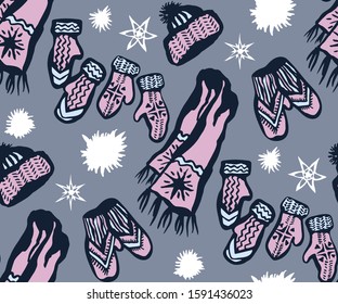 Seamless pattern with knitted mittens, scarf and hats. Ornamental decorative background. Vector pattern. Print for textile, cloth, wallpaper, scrapbooking