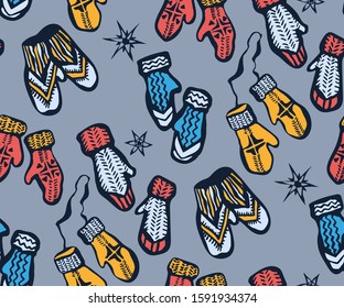 Seamless pattern with knitted mittens, scarf and hats. Ornamental decorative background. Vector pattern. Print for textile, cloth, wallpaper, scrapbooking