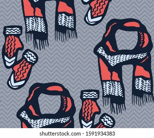 Seamless pattern with knitted mittens, scarf and hats. Ornamental decorative background. Vector pattern. Print for textile, cloth, wallpaper, scrapbooking
