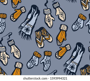 Seamless pattern with knitted mittens, scarf and hats. Ornamental decorative background. Vector pattern. Print for textile, cloth, wallpaper, scrapbooking
