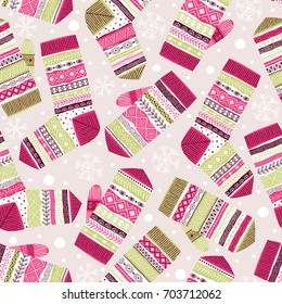 Seamless pattern. Knitted mittens and wool socks. Freehand drawing