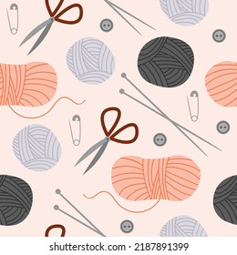 Seamless pattern with knitting needles and balls of yarn. Craft materials background.