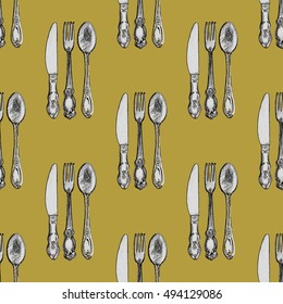 Seamless pattern with knives, forks and spoons . Hand drawn abstract background.
