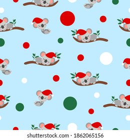 Seamless pattern with koala babies in red Christmas hats sleeping on eucalyptus branches. Pastel blue background. White, red and green confetti. Post cards, textile, wallpaper and wrapping paper