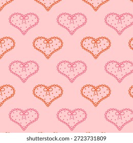 Nahtloses Muster mit Herz im Spitzenstil in rosa und orangefarbenen Tönen. Romantisches Dekorationsdesign für Valentinstag-Verpackungen, Textilien, Schreibwaren und süße Liebesprojekte.