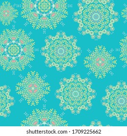 Seamless pattern with laced snowflakes on turquiose background