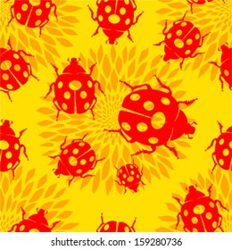 Seamless pattern with ladybirds and flowers