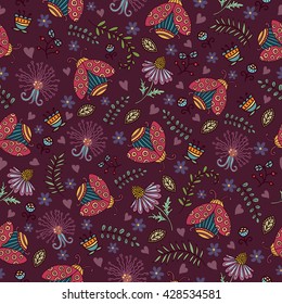 Seamless pattern with ladybirds and wildflowers