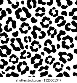 The seamless pattern of large black and white spots imitates the skin of a leopard. Great for decorating fabrics, textiles, gift wrapping design, any printed materials, including advertising.