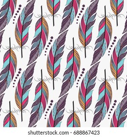 Seamless pattern with large colored feathers and dots. Boho Style