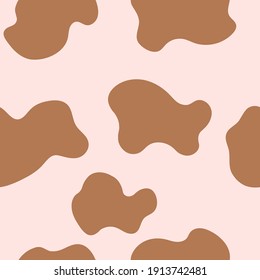 Seamless pattern with large cow spots in brown, beige colors. Mosaic and terrazzo texture. For decor, textiles, fabrics, packaging, wrapping paper, wallpaper, design, banners, templates